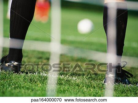 Goal keeper in front of goal area, low section, close-up, blurred. View Large Photo Image Stock Image - Goal keeper in front of goal area, low section, close-up, blurred.. Fotosearch
