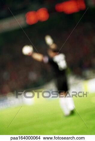 Goal keeper, side view, blurred. View Large Photo Image Picture - Goal keeper, side view, blurred.. Fotosearch