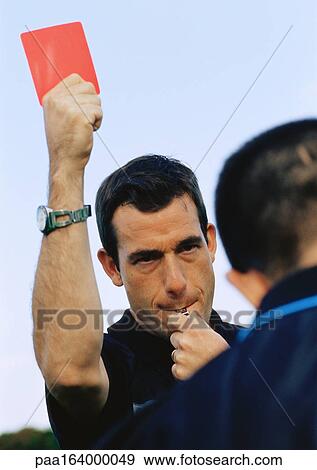 Referee showing red card in soccer match, portrait. View Large Photo Image Stock Photo - Referee showing red card in soccer match, portrait.. Fotosearch