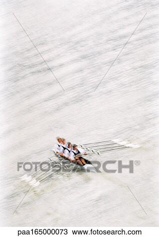 Four men rowing crew in boat, elevated view, blurred. View Large Photo Image Stock Image - Four men rowing crew in boat, elevated view, blurred.. Fotosearch