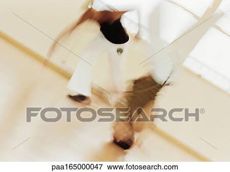 Two men performing capoeira, blurred. View Large Photo Image Stock Photo - Two men performing capoeira, blurred.. Fotosearch