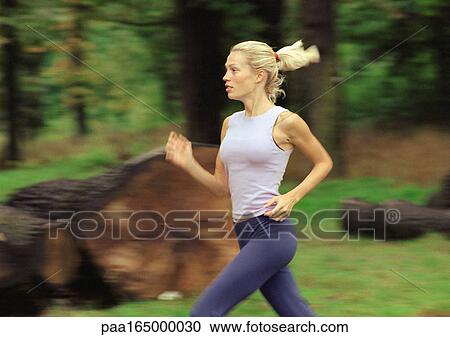 Woman running, side view. View Large Photo Image Stock Image - Woman running, side view.. Fotosearch
