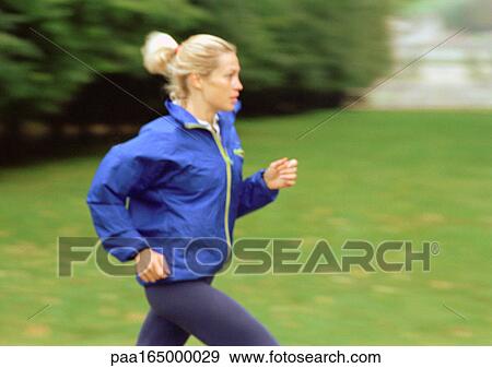 Woman running, side view. View Large Photo Image Stock Photo - Woman running, side view.. Fotosearch