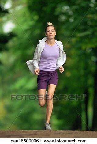Woman running. View Large Photo Image Stock Image - Woman running.. Fotosearch