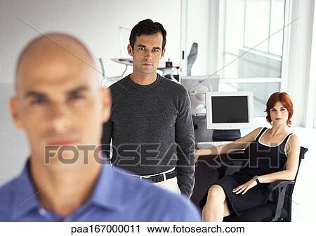 Business people in office, portrait View Large Photo Image Stock Image - Business people in office, portrait. Fotosearch