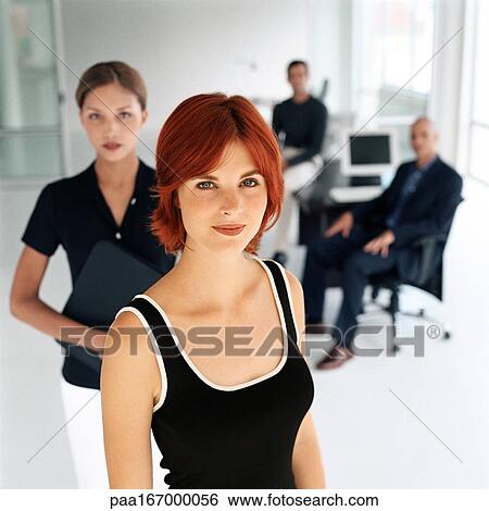 Stock Photograph - Business people in office, portrait. Fotosearch