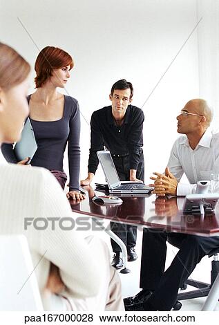 Business people in office View Large Photo Image Stock Photo - Business people in office. Fotosearch