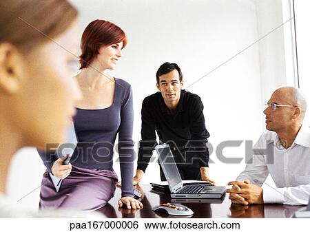 Stock Photograph - Business people in office. Fotosearch