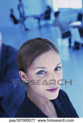 Businesswoman in office, portrait View Large Photo Image Stock Photo - Businesswoman in office, portrait. Fotosearch
