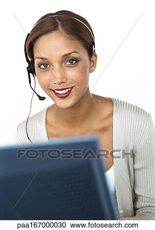 Businesswoman wearing headset, portrait View Large Photo Image Stock Image - Businesswoman wearing headset, portrait. Fotosearch