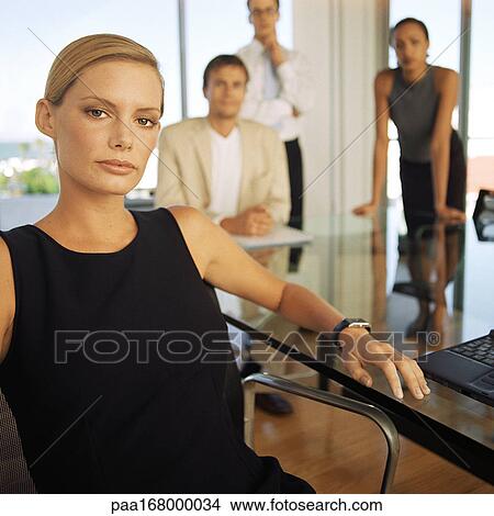 Business people in office, portrait View Large Photo Image Picture - Business people in office, portrait. Fotosearch