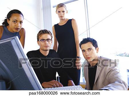 Stock Photograph - Business people in office, portrait. Fotosearch