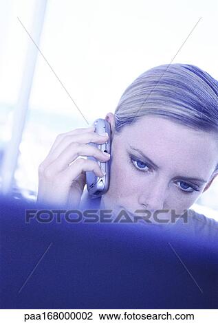 Businesswoman using cell phone View Large Photo Image Stock Image - Businesswoman using cell phone. Fotosearch