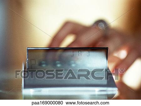 Hand on calculator, close-up, blurred View Large Photo Image Stock Image - Hand on calculator, close-up, blurred. Fotosearch