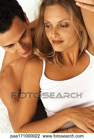 Couple embracing, close-up View Large Photo Image Stock Image - Couple embracing, close-up. Fotosearch