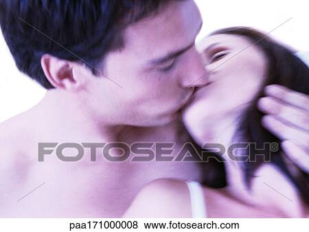Couple kissing, close-up View Large Photo Image Stock Photo - Couple kissing, close-up. Fotosearch