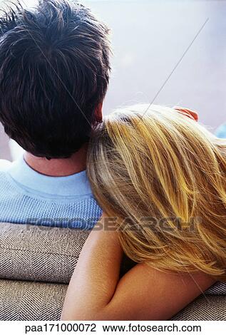 Woman resting head on man's shoulder, rear view View Large Photo Image Stock Image - Woman resting head on man's shoulder, rear view. Fotosearch