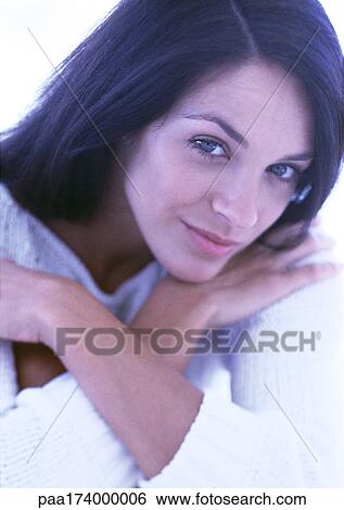 Woman smiling, portrait, close-up View Large Photo Image Stock Photograph - Woman smiling, portrait, close-up. Fotosearch
