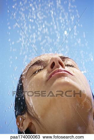 Woman under shower, close up View Large Photo Image Stock Image - Woman under shower, close up. Fotosearch