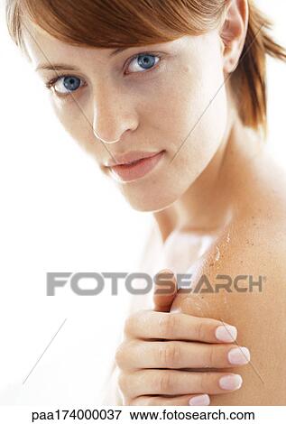 Woman with hand on shoulder, close-up, portrait View Large Photo Image Stock Photo - Woman with hand on shoulder, close-up, portrait. Fotosearch