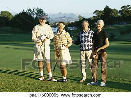 Four mature golfers on green, portrait View Large Photo Image Stock Photography - Four mature golfers on green, portrait. Fotosearch