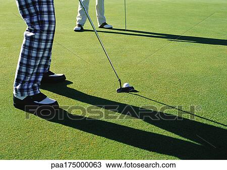 Golfers, low section View Large Photo Image Stock Image - Golfers, low section. Fotosearch
