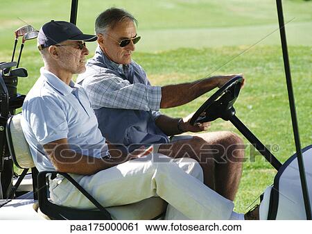 Two mature golfers in golf cart, close-up, side view View Large Photo Image Stock Image - Two mature golfers in golf cart, close-up, side view. Fotosearch