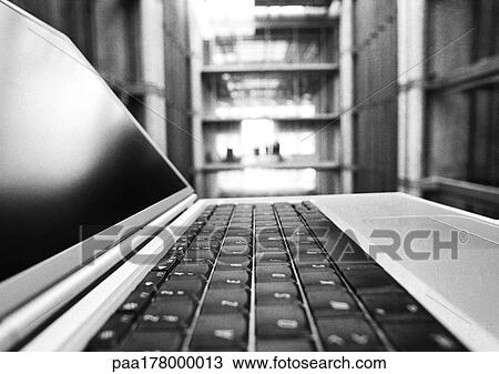 Laptop computer, side view, close-up, b&w View Large Photo Image Stock Image - Laptop computer, side view, close-up, b&w. Fotosearch