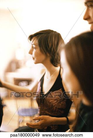 People in living room View Large Photo Image Stock Photo - People in living room. Fotosearch