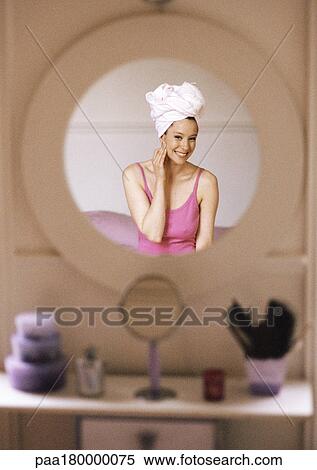 Reflection of woman in mirror View Large Photo Image Stock Photography - Reflection of woman in mirror. Fotosearch