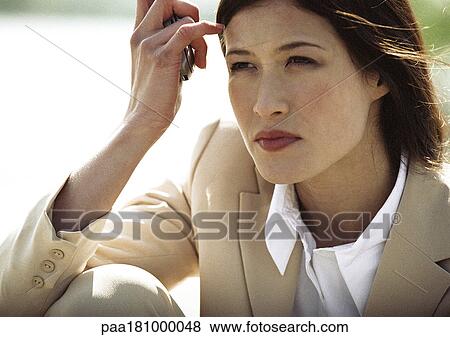 Businesswoman outdoors, close-up View Large Photo Image Stock Photo - Businesswoman outdoors, close-up. Fotosearch