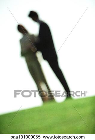 Two people in park, blurred View Large Photo Image Stock Photography - Two people in park, blurred. Fotosearch
