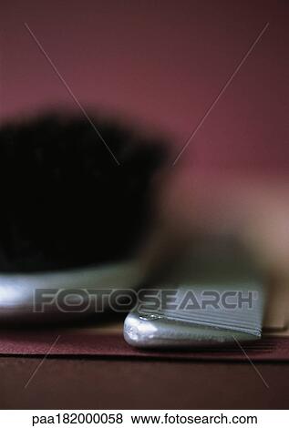 Brush and comb, close-up View Large Photo Image Stock Photo - Brush and comb, close-up. Fotosearch