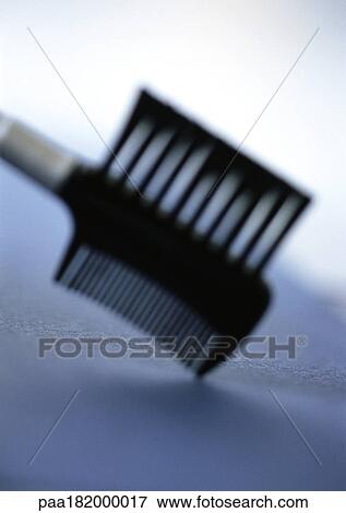 Eyebrow comb and brush, close-up View Large Photo Image Stock Photo - Eyebrow comb and brush, close-up. Fotosearch