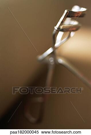 Eyelash curler, close-up View Large Photo Image Stock Photography - Eyelash curler, close-up. Fotosearch
