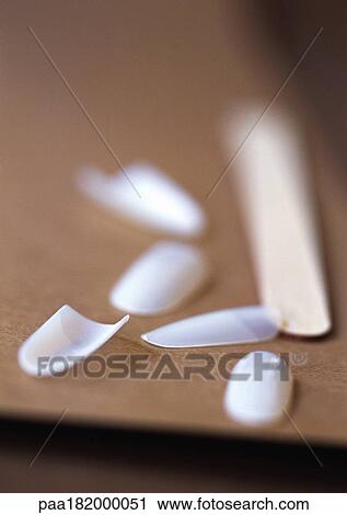 False fingernails and fingernail file, close-up, blurred View Large Photo Image Stock Image - False fingernails and fingernail file, close-up, blurred. Fotosearch