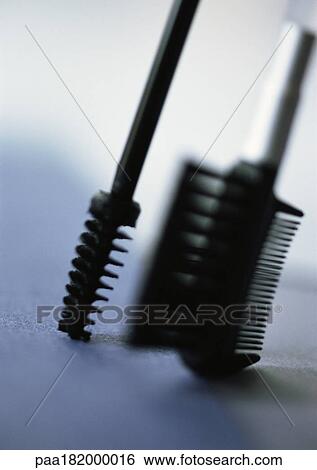 Mascara brush and eyebrow comb, close-up View Large Photo Image Stock Photograph - Mascara brush and eyebrow comb, close-up. Fotosearch