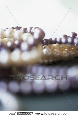 Pearl jewelry, close-up, blurred View Large Photo Image Stock Photo - Pearl jewelry, close-up, blurred. Fotosearch