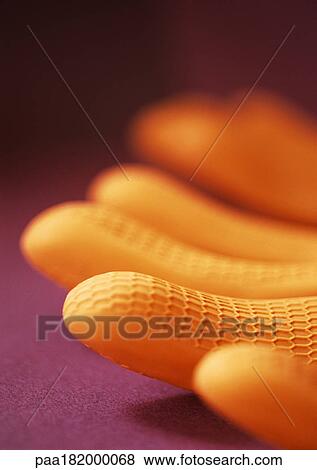Stock Photo - Rubber gloves, extreme close-up. Fotosearch