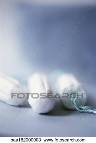 Stock Photo - Tampons, close-up, blurred. Fotosearch