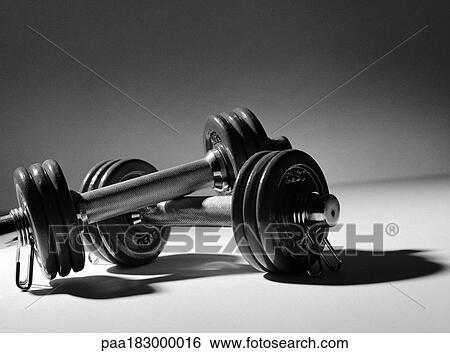 Dumbbells, close-up, b&w View Large Photo Image Stock Photograph - Dumbbells, close-up, b&w. Fotosearch