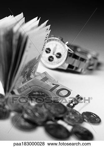 Money and watch, close-up, b&w View Large Photo Image Stock Photo - Money and watch, close-up, b&w. Fotosearch