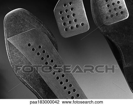 Pedals and soles of shoes, close-up, b&w View Large Photo Image Stock Image - Pedals and soles of shoes, close-up, b&w. Fotosearch