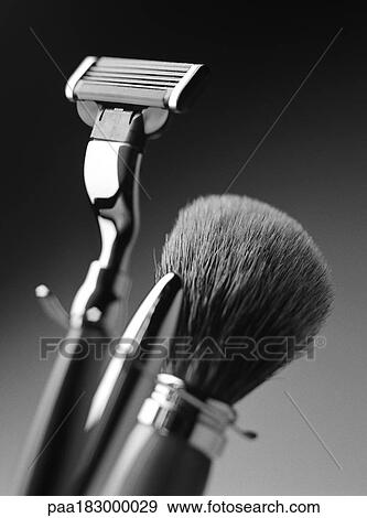 Razor and shaving brush, close-up, b&w View Large Photo Image Stock Photo - Razor and shaving brush, close-up, b&w. Fotosearch