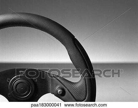 Steering wheel, close-up, b&w View Large Photo Image Stock Image - Steering wheel, close-up, b&w. Fotosearch