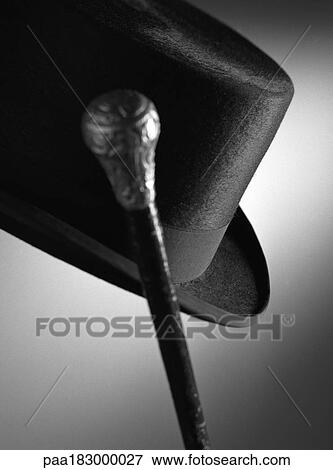 Top hat and stick, close-up, b&w View Large Photo Image Stock Photo - Top hat and stick, close-up, b&w. Fotosearch
