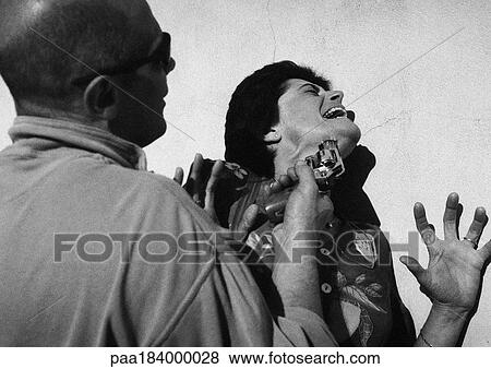 Man threatening woman with gun, b&w View Large Photo Image Stock Photo - Man threatening woman with gun, b&w. Fotosearch