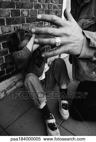 Person protecting self from assailant, close-up, b&w View Large Photo Image Stock Photography - Person protecting self from assailant, close-up, b&w. Fotosearch