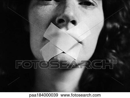 Woman with tape over mouth, close-up, blurred View Large Photo Image Stock Photo - Woman with tape over mouth, close-up, blurred. Fotosearch