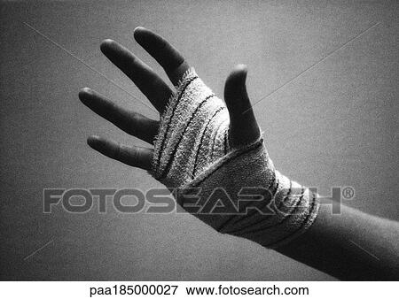 Bandaged hand, close-up, b&w View Large Photo Image Stock Photo - Bandaged hand, close-up, b&w. Fotosearch